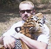 Client holding a tiger