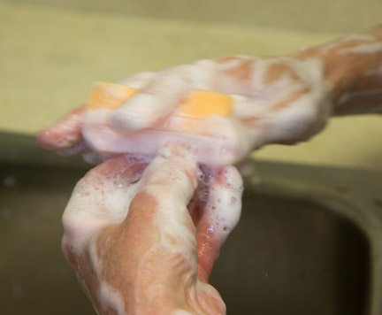 Surgeon scrubbing hands