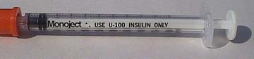 A U-100 insulin syringe