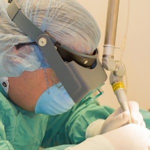Dr. R Using Magnifying Glasses During A Laser Surgery