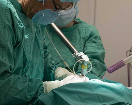 Dr. P Teaching Student How To Use The Laser