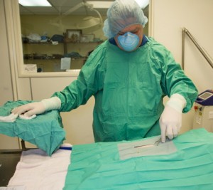 Draping our patient prior to surgery